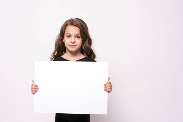 istock Little girl. White list. Light background 1150672526
