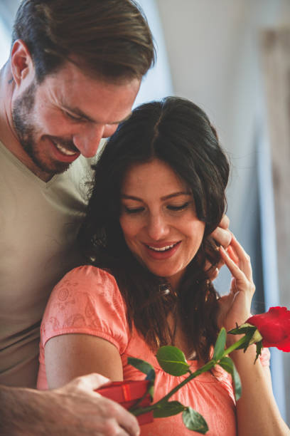 istock Giving his wife her anniversary gift 1150673868