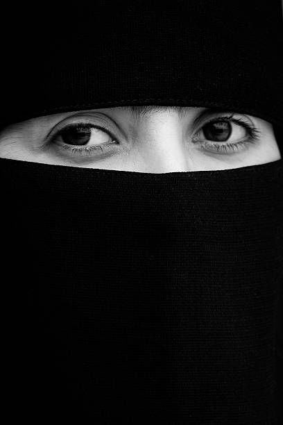 istock Innocent Woman Eyes Behind Religious Veil 115067677