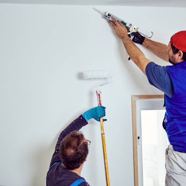 istock Two handymen working together on a house renovation. 1150679669