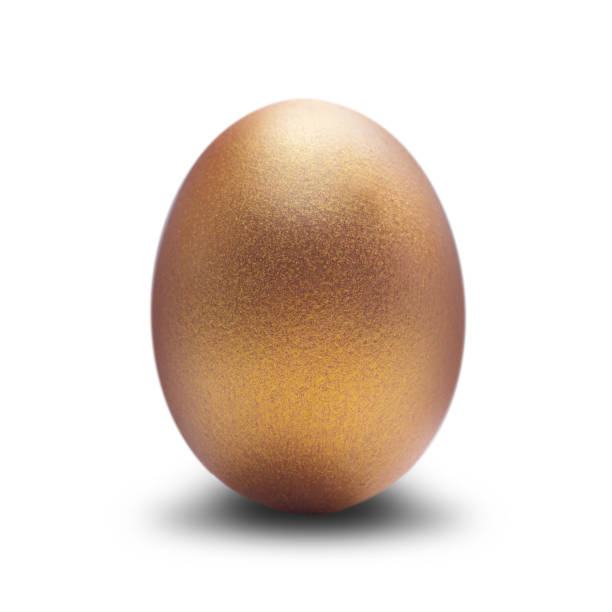 istock Realistic golden egg isolated on white background. 1150681659