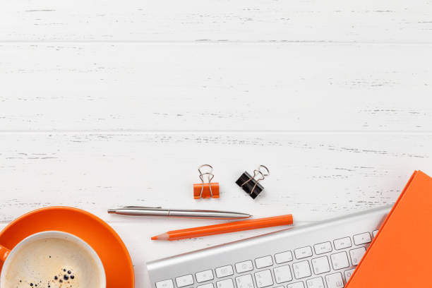 istock Office workplace with coffee, supplies and computer 1150683282