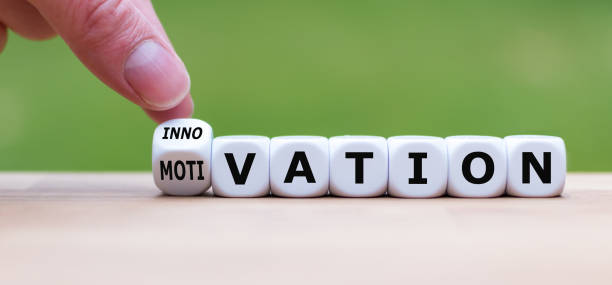 istock Hand turns a dice and changes the word 