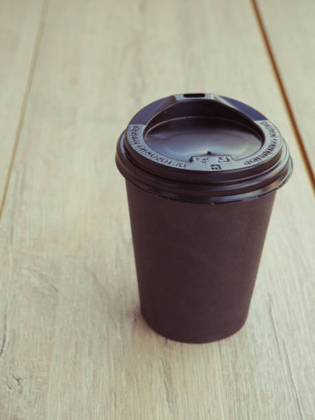 istock cup of coffee on wood table 1150686258