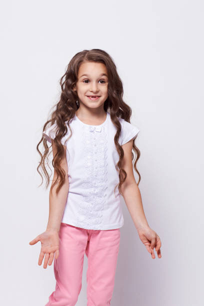istock Little girl. Bewilderment. Emotions misunderstanding 1150687665