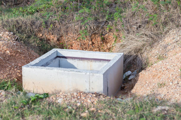 istock Concrete construction tube pipe. Building a road sewer drain system. Sewer construction. 1150690743