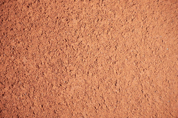 istock Red sand texture of tennis field 1150691046