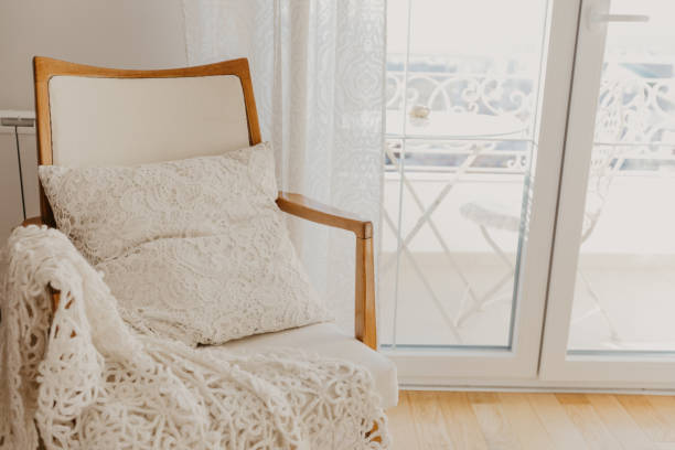 istock white armchair with plaid and pillow . Provence style - Image 1150691302