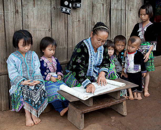 Lessons with children ethnic group Meo, Asia Lessons with children ethnic group Meo, Asia, learn traditional manual labour miao minority stock pictures, royalty-free photos & images