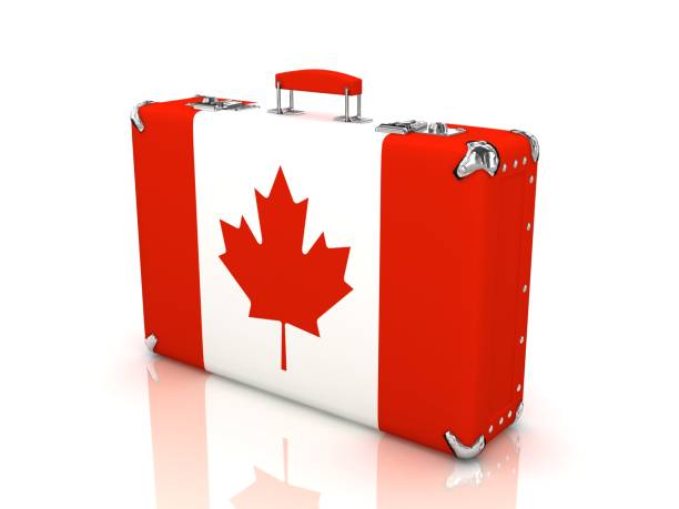istock Travel suitcase Canada flag 1150694906