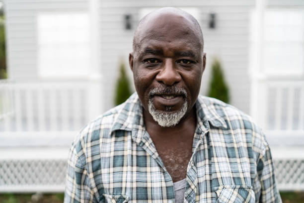 istock Mature african man standing outdoors and looking at camera 1150696817