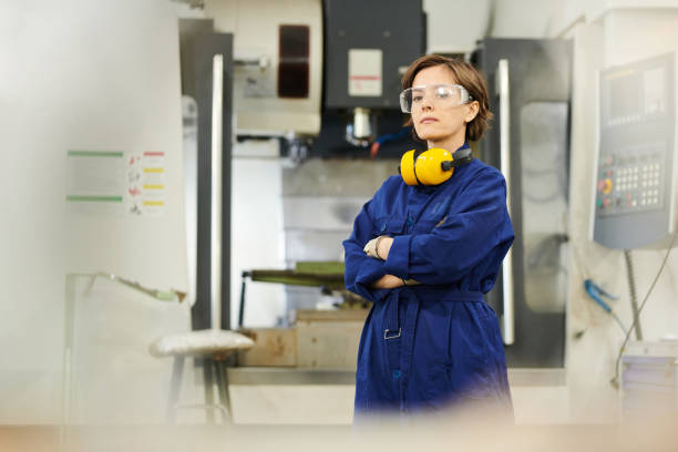 istock Strong Woman Posing at Factory 1150699992