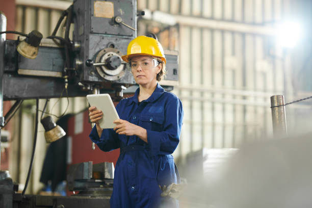 istock Female Worker Using Tablet at Factory 1150700058