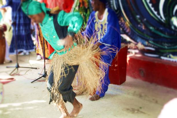 Performance in Hamel Alley in summer sunday, Havana (Cuba). Summer sunday, Havana (Cuba). Show in the alley of Hamel, dance and traditional songs. showtime stock pictures, royalty-free photos & images