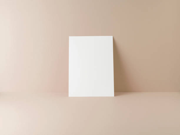 istock Blank White Card on Brown Background and Shadow 1150700852