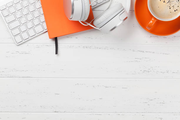 istock Office workplace with coffee, headphones and pc 1150702477
