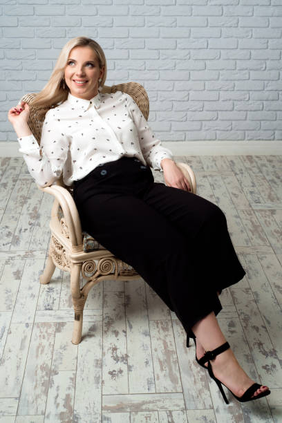 istock Young pretty woman wearing white shirt. Studio background. 1150707588