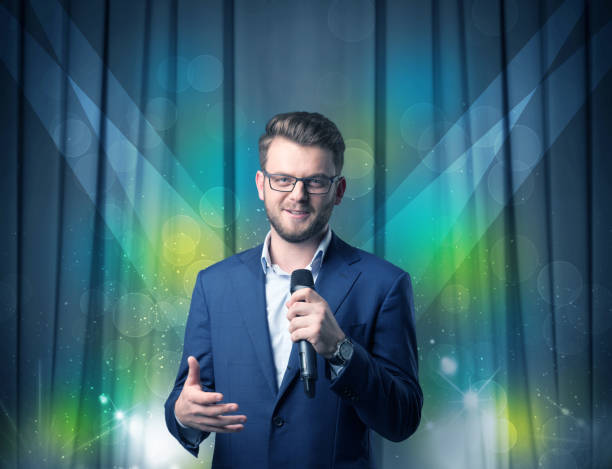 istock Businessman holding microphone 1150708022
