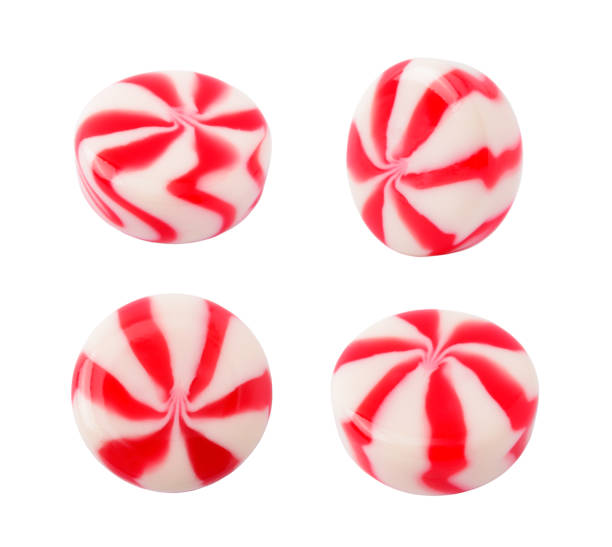 caramel striped candy - stick of hard candy candy cane candy peppermint imagens e fotografias de stock