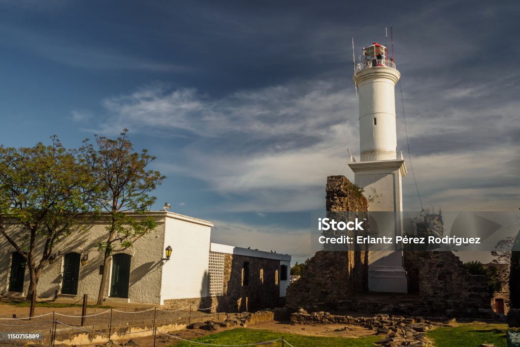 Lighthouse of Colonia del Sacramento in Uruguay, with ruin by its side Colonia del Sacramento Stock Photo