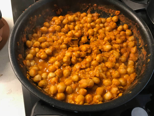 Chole or Chana Masala or Spicy Chickpeas is traditional North Indian main course recipe and usually served with Bhature or Roti/ Naan.