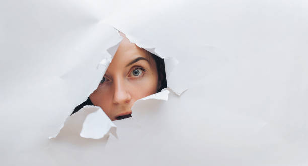 istock A girl with a stunned expression. Scared look. Surprised look. 1150718146