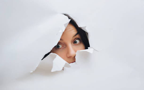 istock A curious female look. Spying on or overhearing the concept. 1150718265
