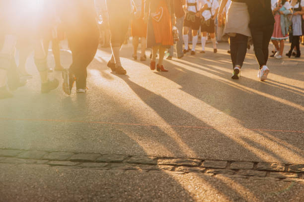 istock Visitors walking through beer festival fairgrounds 1150719166