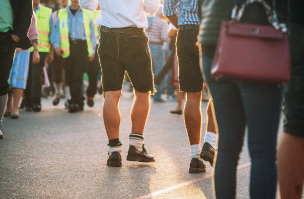 istock Visitors walking through beer festival fairgrounds 1150719216
