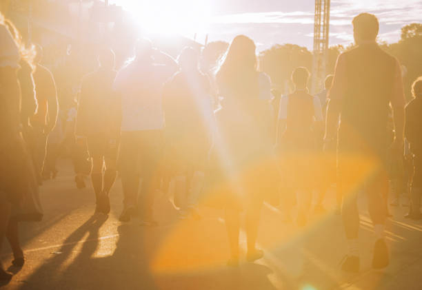 istock Visitors walking through beer festival fairgrounds 1150719334