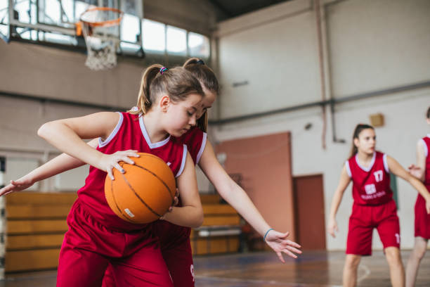 istock Rivalry between girls during basketball game 1150720875