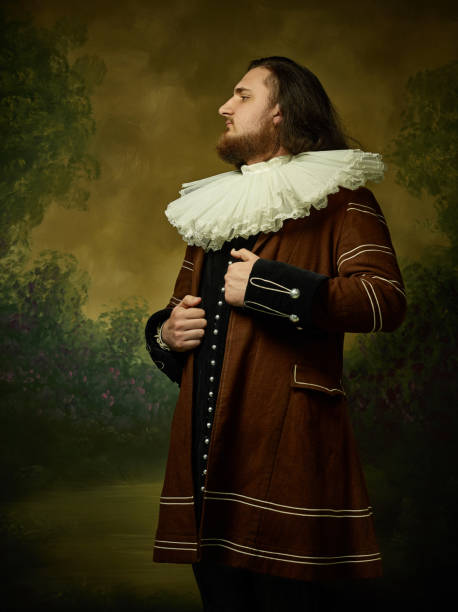 istock Young man as a medieval knight on dark background 1150722493