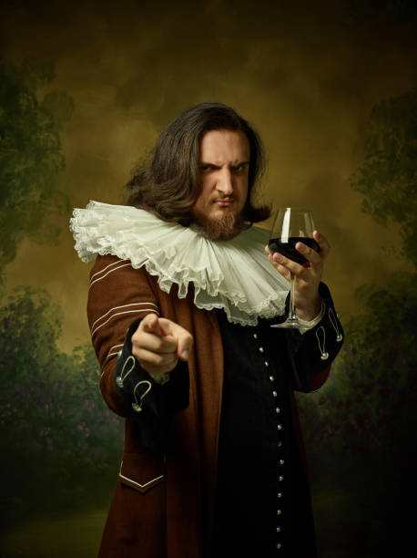 istock Young man as a medieval knight on dark background 1150722504