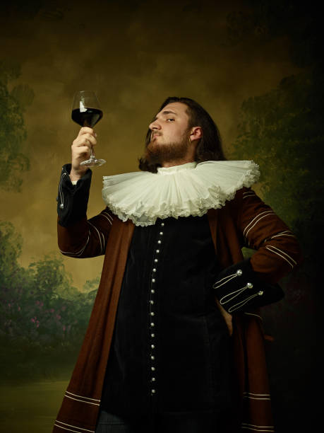 istock Young man as a medieval knight on dark background 1150722508