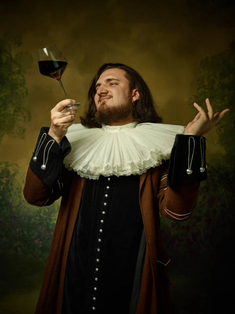 istock Young man as a medieval knight on dark background 1150722510