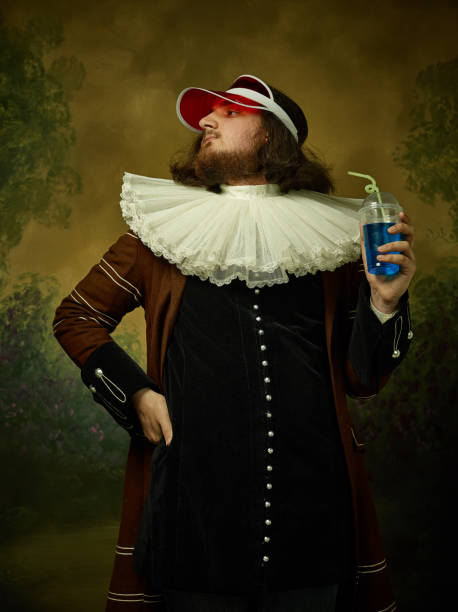 istock Young man as a medieval knight on dark background 1150722528