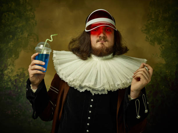 istock Young man as a medieval knight on dark background 1150722559