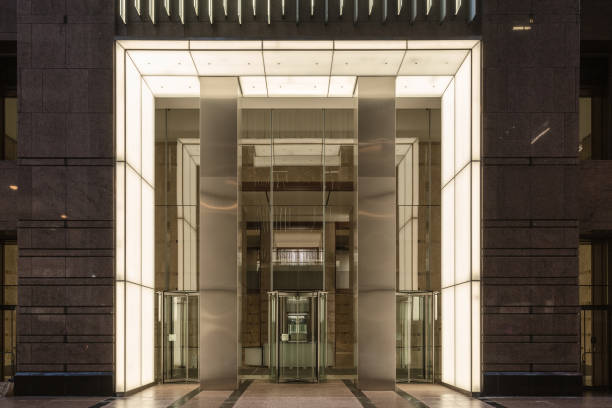 istock Well lit front of a large skyscraper in downtown chicago 1150722834