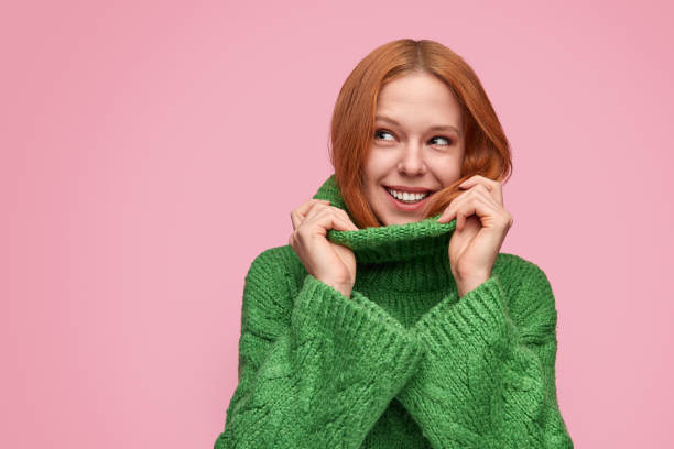 coquette pretty girl in green sweater - people joy relaxation concentration imagens e fotografias de stock