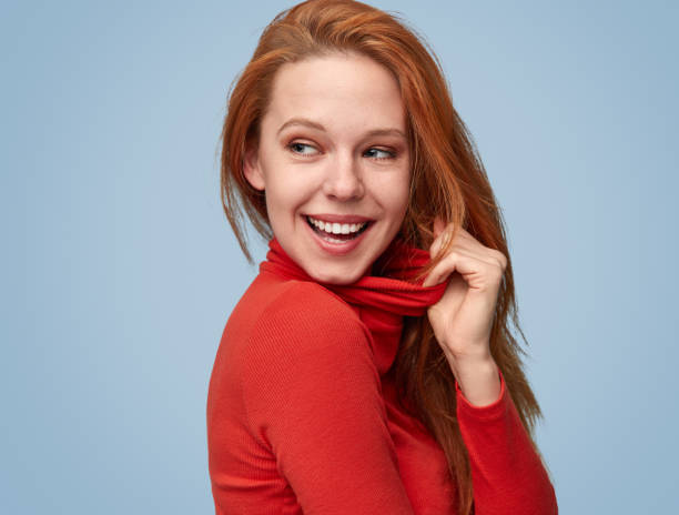 istock Coquette girl in red turtleneck 1150723051