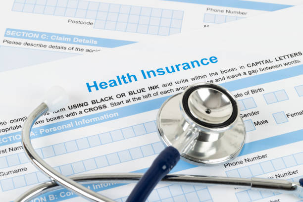 istock Health insurance application form with stethoscope and calculator 1150724240