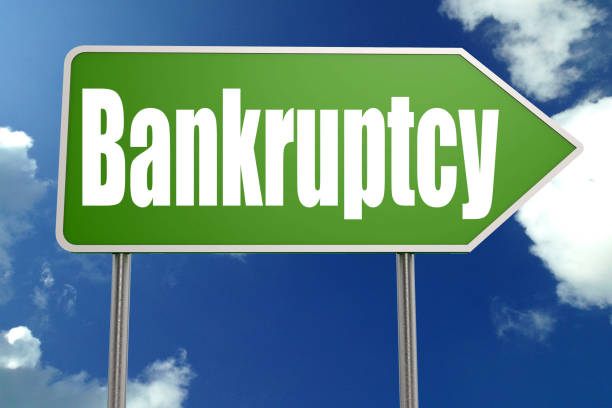 istock Bankruptcy word on green road sign 1150724701
