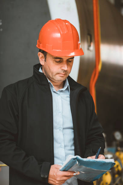 istock Male Technician Doing a Quality Control at the Heating Station 1150727112