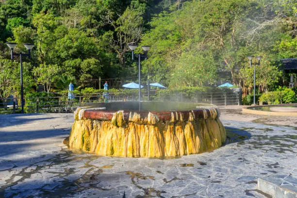 Famous hot spring well in Raksa Warin public park, Ranong, Thailand.