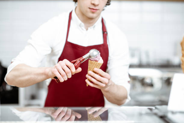 istock Man making ice cream in the shop 1150729346