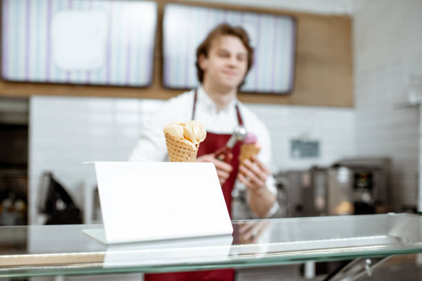 istock Man making ice cream in the shop 1150729351