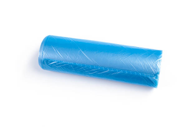 istock roll of plastic garbage bags isolated on white background 1150730457