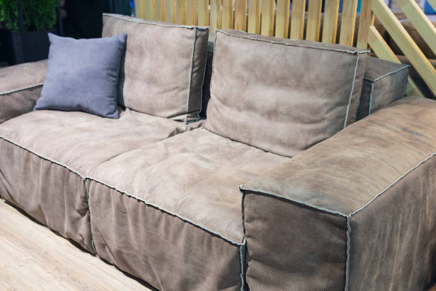 istock Comfortable elegant sofa with pillows close-up. Furniture 1150730792