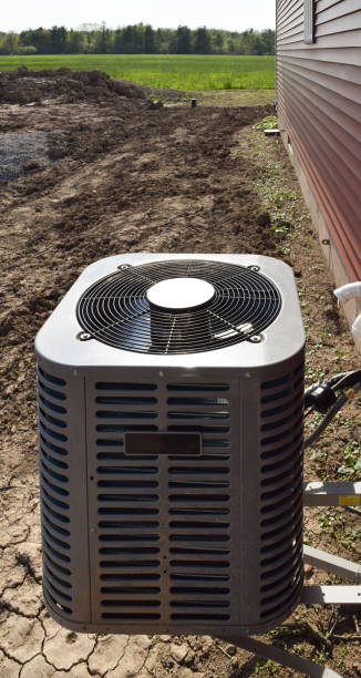 istock Air Conditioning Unit Installed on New Home House Construction Builders Cooling 1150731595