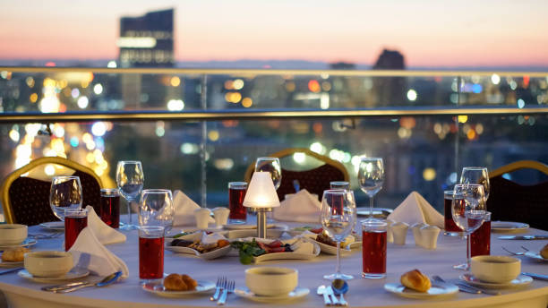 istock fancy sunset table on roof tea time 1150732548